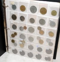 A folder containing a quantity of sorted coins, mostly Italy dating back to 1810.