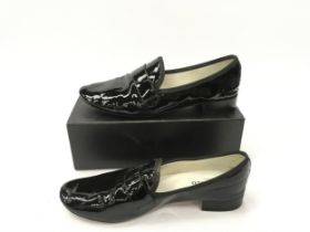 A pair of Repetto Paris black leather patent shoes, Size 42 in box.