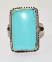 A 925 silver and large turquoise ring Size M 1/2.