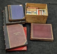 A box of various vintage books together with some large scale mainly empty antique scrapbooks.