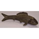 A cast metal carp.