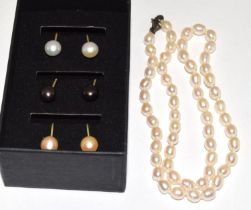 3 pairs of cultured pearl clip earrings and necklace.