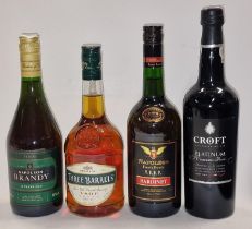 Four bottles of misc alcohol to include three bottles of brandy.