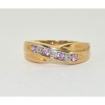 9ct gold ladies diamond and Pink Tourmaline cross over ring size M