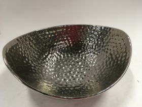 A silver coloured decorative bowl. (40)