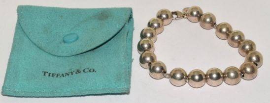 Tiffany & Co Fully marked silver bracelet and bag.