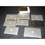 A quantity of Apple MacBooks, no cables, untested