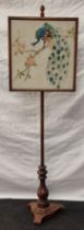 Mahogany pole screen with a Bird embroidery screen set on a triple scrolled base 150cm tall screen