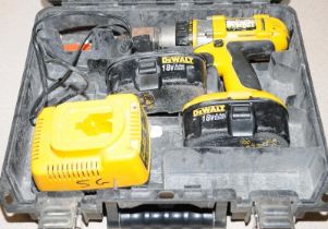 DeWalt cordless hammer drill with spare battery and charger in poly carry case