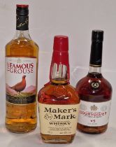 Three bottles of alcohol: Maker's Mark Whisky, The Famous Grouse Scotch Whisky and Courvoisier VS
