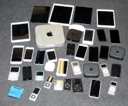 A quantity of Apple iPads, iPhones, iPods etc c/w a Sony Walkman minidisc recorder. All, offered