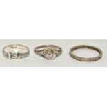 3 x 925 silver rings a buckle ring, eternity ring and a bean ring