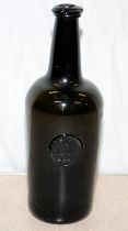 Late 18thC dark olive green wine bottle with W Clapcott seal. From a small collection found at