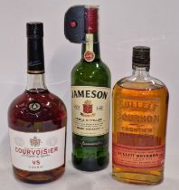 Three bottles of alcohol: Courvoisier VS Cognac, Jameson Irish Whiskey and Bulleit Bourbon