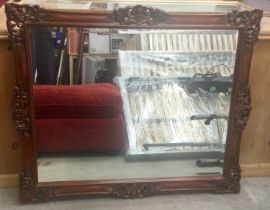 Modern mahogany bevelled edged decorative mirror 111x90cm.