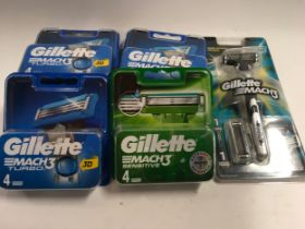 A Gillette Mach3 razor together with 5 x 4 Mach 3 turbo heads and a pack of Mach 3 sensitive. (2)