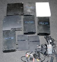 A collection of games consoles, mostly PS2/PS3
