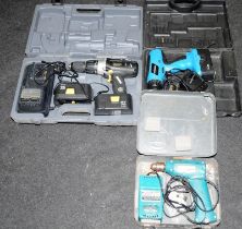 A Makita corded drill, a Powerbase cordless hammer drill and a Draper Expert hammer drill. All cased