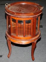 Mahogany glazed drinks cabinet with removable drinks serving tray to top 77cm tall 50cm diameter.