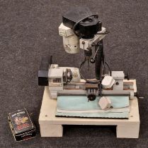 Emco Unimat 3 lathe with drill/milling attachment with tin of cutting tools.