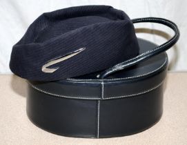 Vintage British Airways female cabin crew cap in original lined leather carry box.
