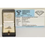 A Diamond solitaire 0.85ct set in 5.8g, 18ct gold with certificate. Size H