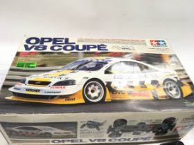 Tamiya Opel V8 Coupe remote control racing car (chassis with 3 shells)