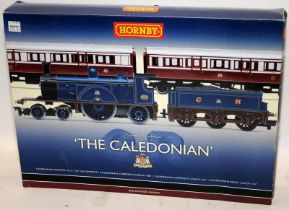 Hornby OO gauge set The Caledonian loco and 3 coaches, set ref:R2610. Boxed