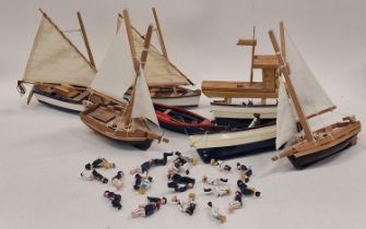 A collection of Naval Cutter cast metal sitting figurines (24 in total) together with eight wooden