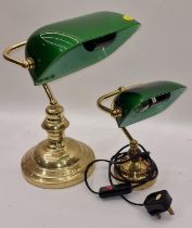 Two contemporary bankers style desk lamps with green glass shades.