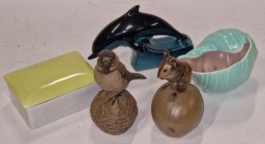 Poole Pottery unusual Dolphin on block base, together with two BLA animals, twintone shell &