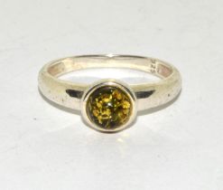 A 925 silver and amber ring Size P