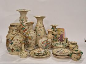 Large quantity of Oriental Satsuma pottery pieces to include vases and plates.