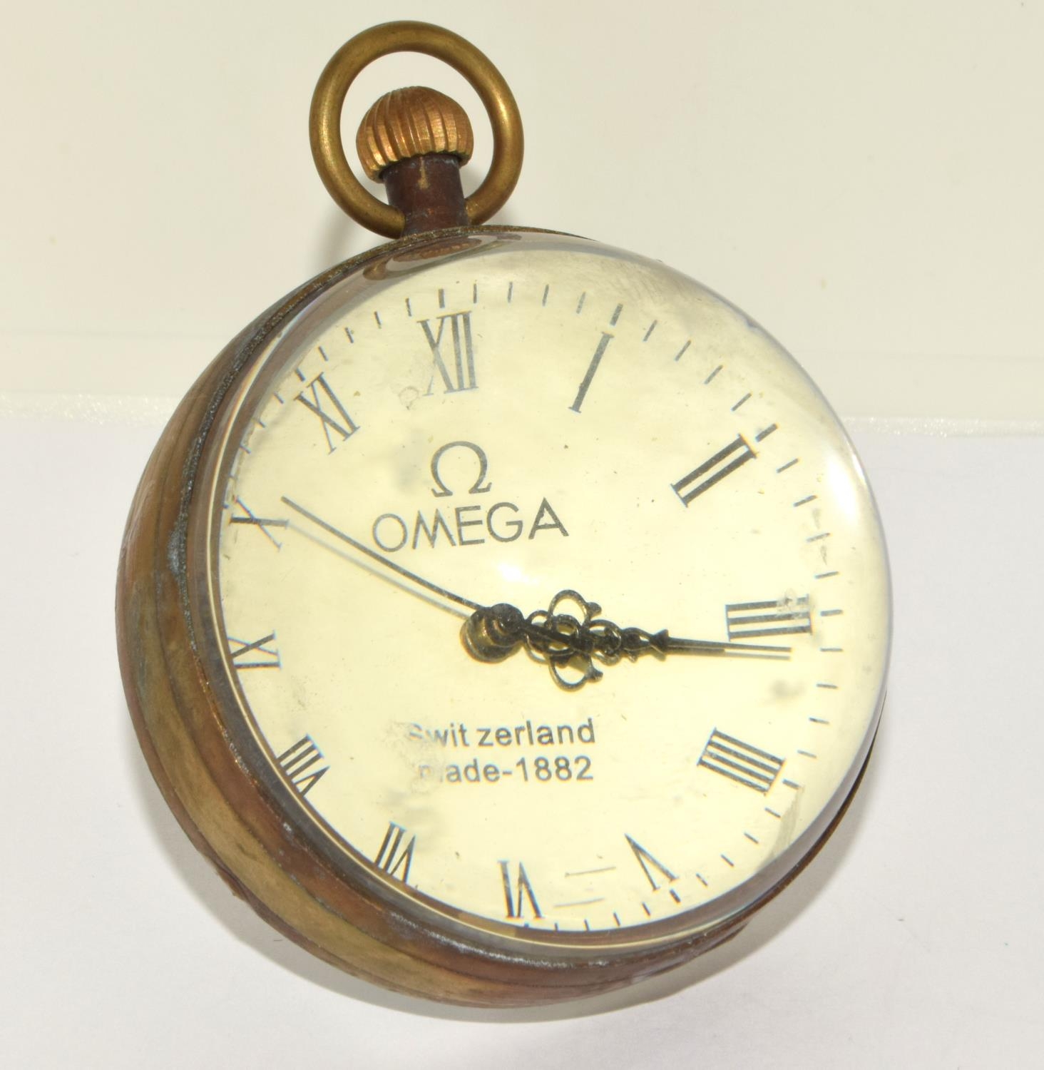Brass cased glass ball shaped Desk clock