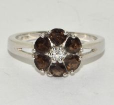 A 925 silver and smokey quartz TGQC flower ring Size R