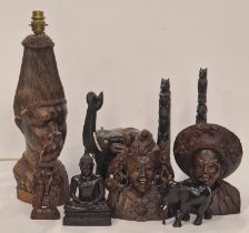 Collection of carved wood figurines to include a lamp (9).