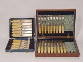 Two boxed sets (one part set) of bone handled silver plated fish knives and forks.