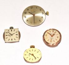 Four Omega wristwatch movements (1 auto and 3 manual wind).