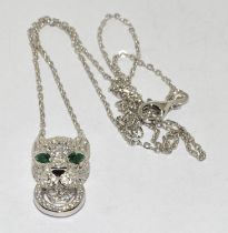 Silver Panther headed pendant necklace with Emerald eyes