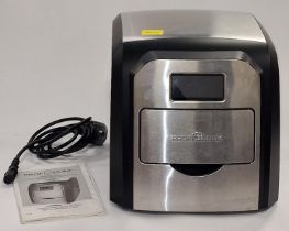 Profi Cook electric ice making machine with instruction manual.