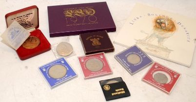 A collection of vintage GB coins including coin sets and Crown coins