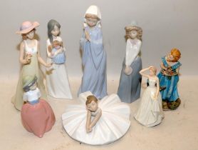 Collection of figurines to include 6 Nao figures. 8 items in lot