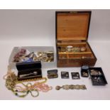 Two boxes containing a collection of costume jewellery, watches and some coins.