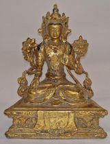 Gilt bronze Tibetan Diety figure 15.5cm tall.