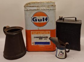 A collection of vintage oil cans to include Gulf, Esso and shell examples (4).