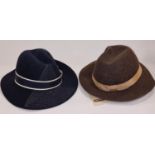 Two vintage fabric gentleman's trilby hats with hat storage box.