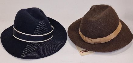 Two vintage fabric gentleman's trilby hats with hat storage box.