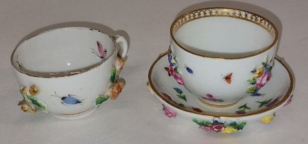 Antique Miessen miniature floral cup and saucer together with another cup all with makers marks.