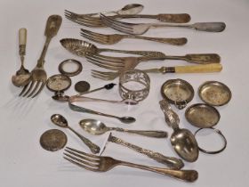 Quantity of silver and silver plated items to include sugar tongs and flatware.