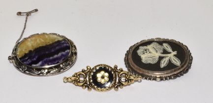 Silver mourning brooch together with a silver blue john brooch and a costume jewellery brooch (3).